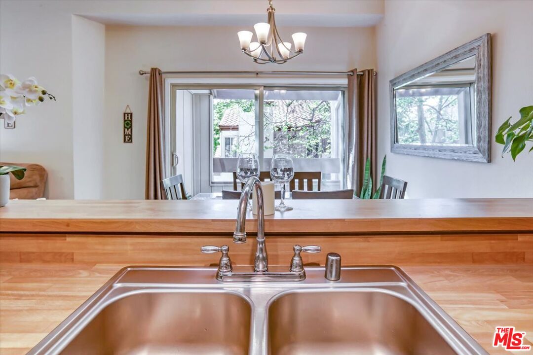 1760 Sinaloa Road, Unit 268 Simi Valley, CA 93065 - Photo 9 of 21 a kitchen with a sink and a window
