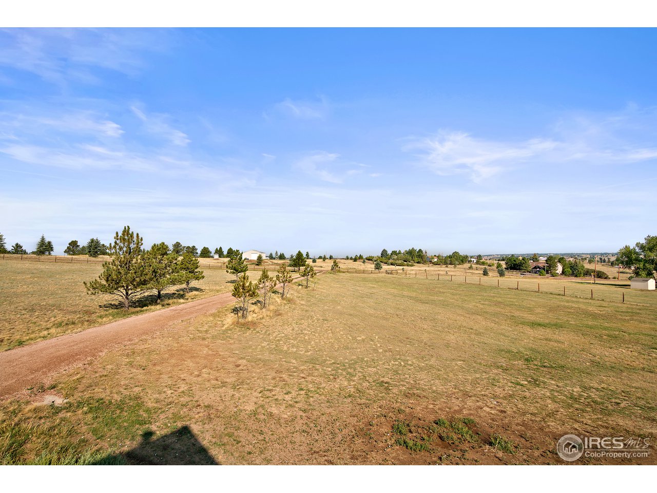 9088 North Awl Road Parker, CO 80138 - Photo 28 of 40 a view of an ocean and beach
