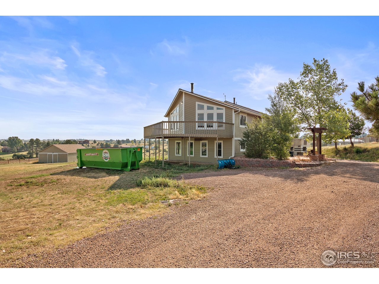 9088 North Awl Road Parker, CO 80138 - Photo 3 of 40 a view of a house with a yard