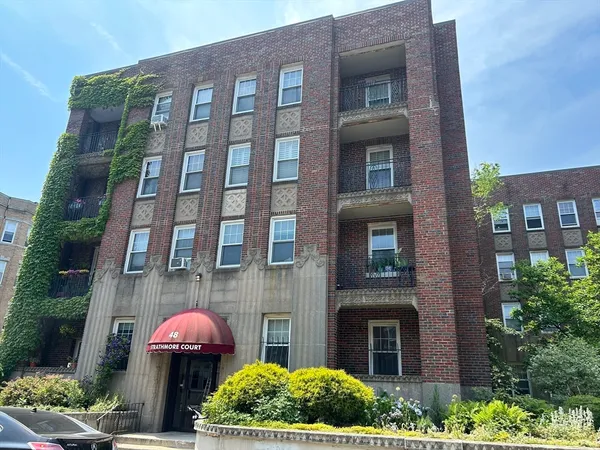 a front view of a multi story residential apartment building