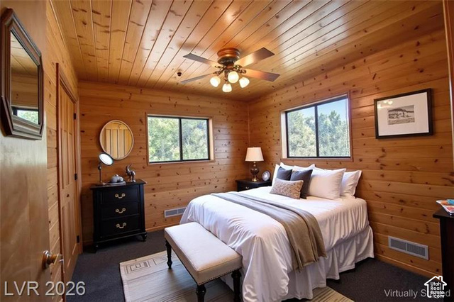 1129 Ponderosa Road, Unit 40 Hatch, UT 84735 - Photo 26 of 47 Wood-paneled walls and ceiling, dual windows, and ceiling fan with integrated lighting