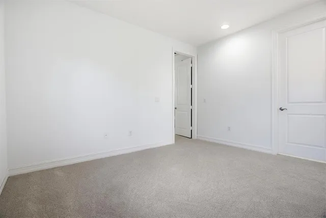 an empty room with an entryway