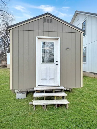 a front view of a house with garage