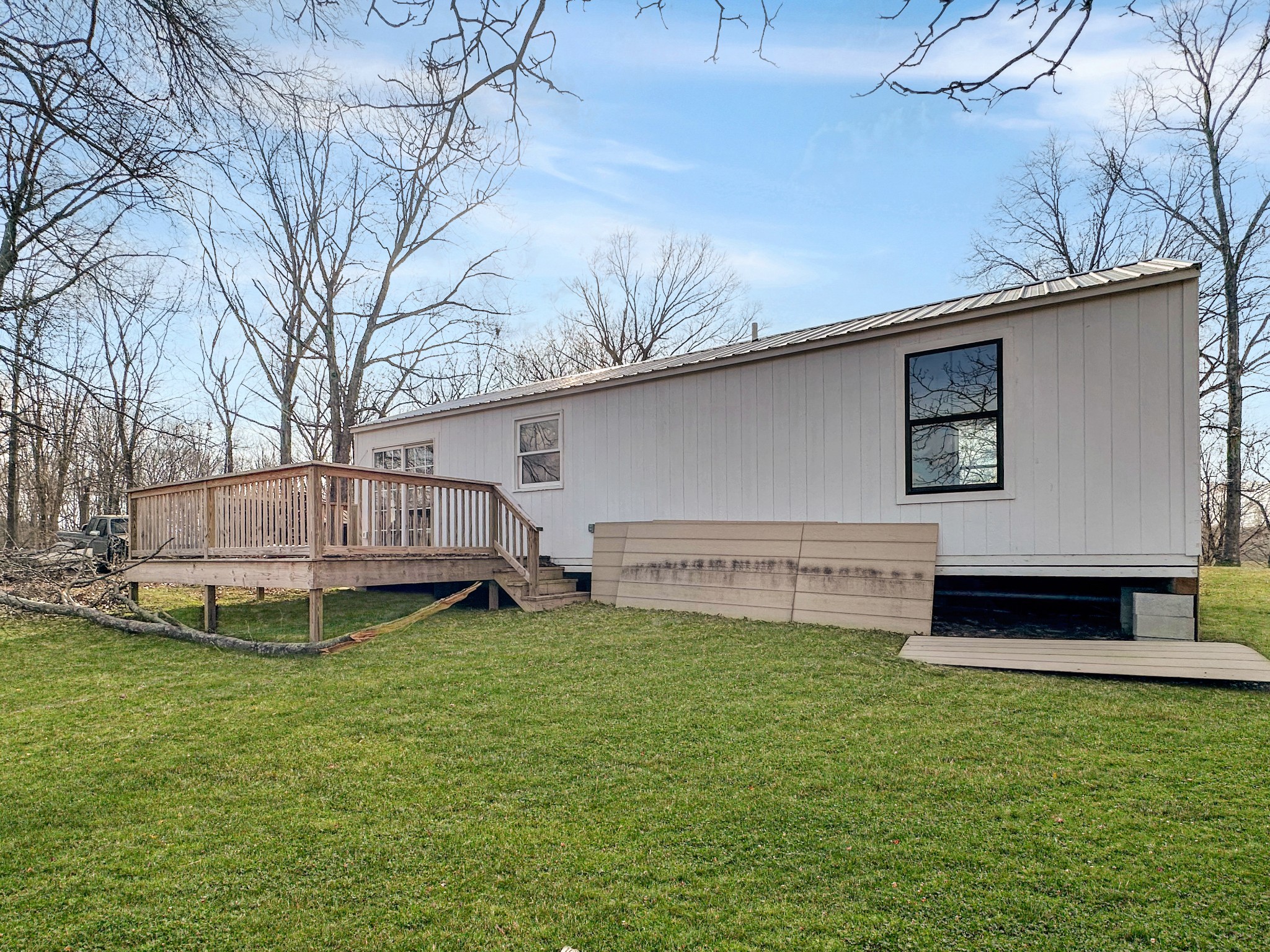 1041 Old Mt Vernon Road Bethpage, TN 37022 - Photo 26 of 46 a view of a backyard with a garden and deck