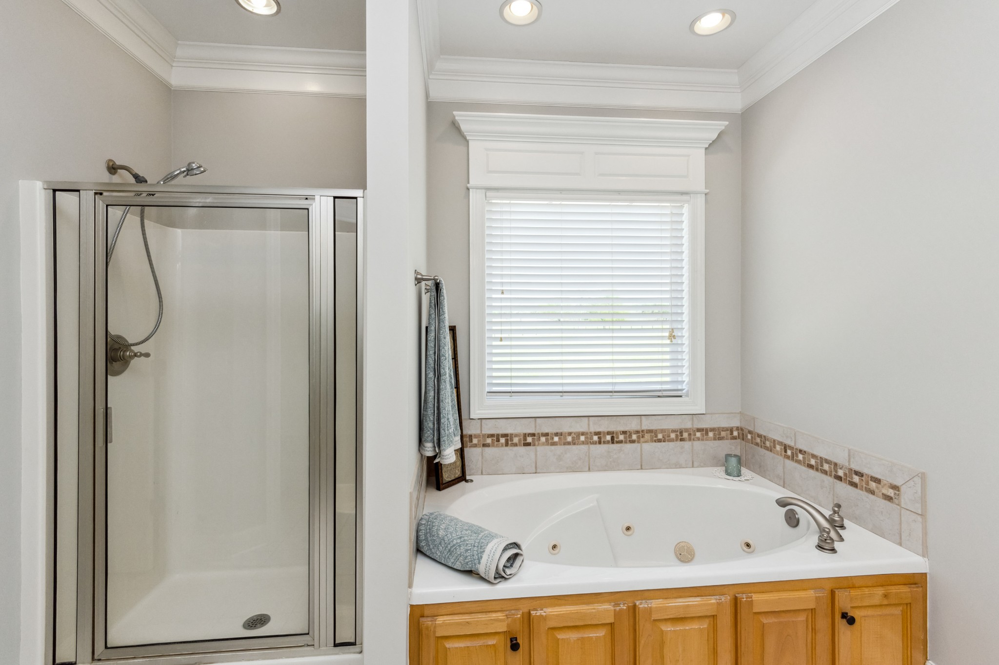 5592 Cedar Grove Road Murfreesboro, TN 37127 - Photo 16 of 43 The other side of the Full Bath which features a walk-in shower and a jetted tub with tile trim!