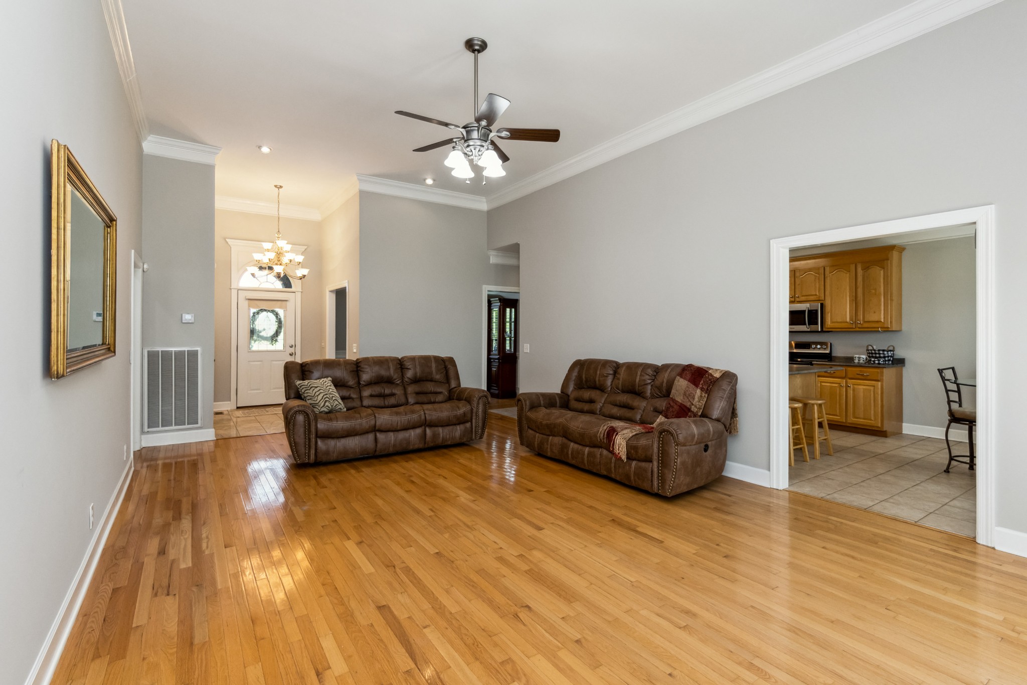 5592 Cedar Grove Road Murfreesboro, TN 37127 - Photo 2 of 43 This is the Living/Great Room with 12 ft ceiling! The main level features hardwood flooring or tile in the wet areas so NO carpet on the first floor! There is also a lot of crown molding throughout!