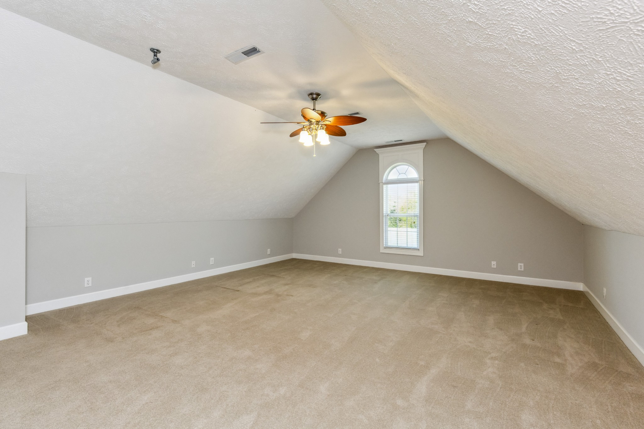 5592 Cedar Grove Road Murfreesboro, TN 37127 - Photo 26 of 43 On the second level, there is a large 15'x20' Bonus/Rec/Media Room, whatever you choose to do! It has a ceiling fan, and this is the only room in the home that is carpeted, but it's plush thick carpet! Make this room whatever you wish!