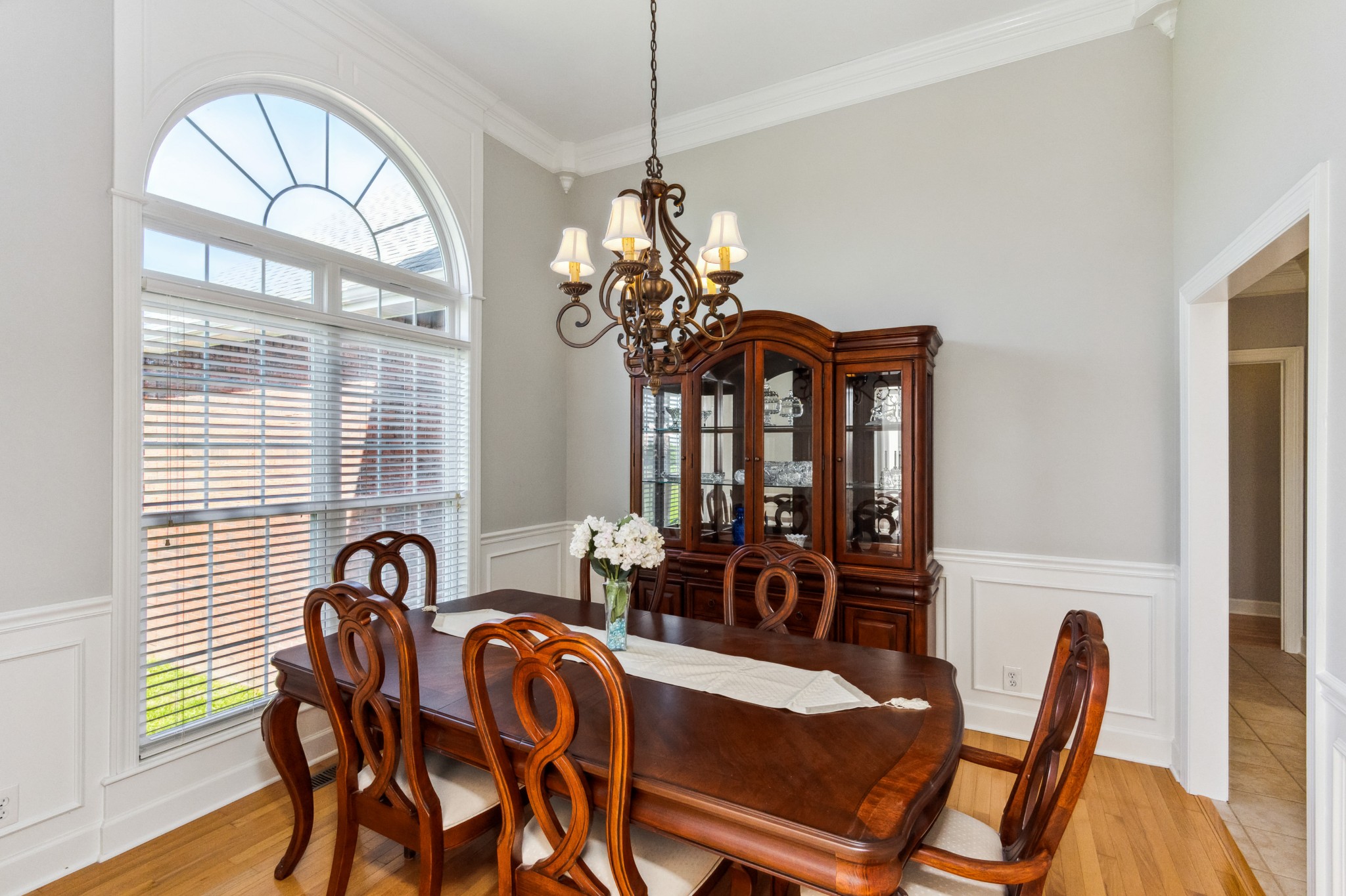 5592 Cedar Grove Road Murfreesboro, TN 37127 - Photo 3 of 43 Notice these beautiful windows with the arched glass in this Formal Dining Room. The home has been repainted completely in this light and bright Agreeable Gray!