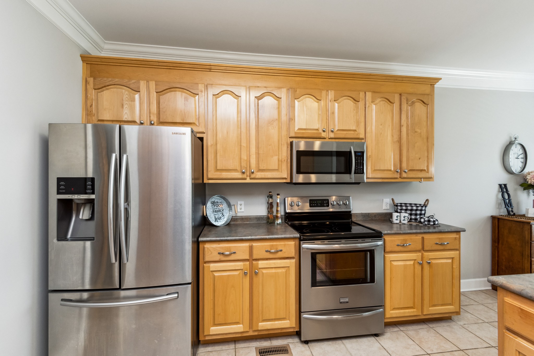 5592 Cedar Grove Road Murfreesboro, TN 37127 - Photo 10 of 43 The other side of the Kitchen has many more cabinets, tile floors and all stainless appliances which stay with this home!