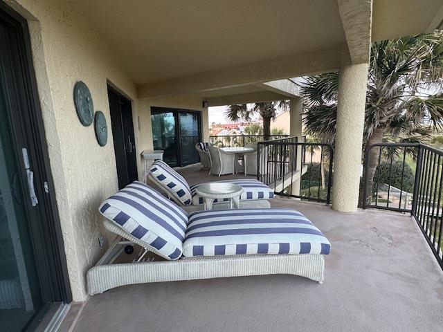 306 Pacifica Vista Way St. Augustine, FL 32080 - Photo 3 of 18 a bedroom with bed and balcony