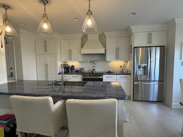 306 Pacifica Vista Way St. Augustine, FL 32080 - Photo 9 of 18 a kitchen with kitchen island a counter top space stainless steel appliances and cabinets
