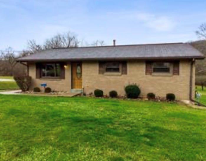 501 Highway 356 Apollo, PA 15613 - Photo 2 of 36 a view of a backyard with plants and large tree