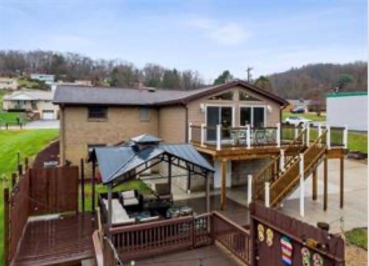 501 Highway 356 Apollo, PA 15613 - Photo 27 of 36 a view of a house with wooden deck and furniture