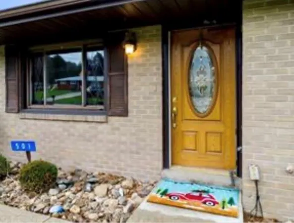 a front view of a house with entryway