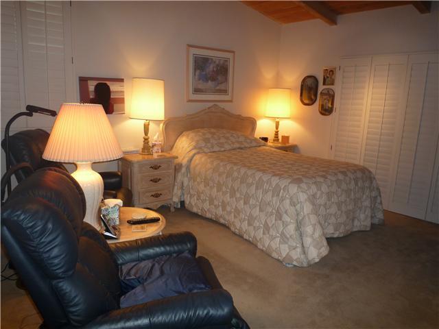 12152 Gay Rio Drive Lakeside, CA 92040 - Photo 17 of 24 Master bedroom / there is a sun room out of the plantation doors on the right which Mr. uses it as his office and workout room