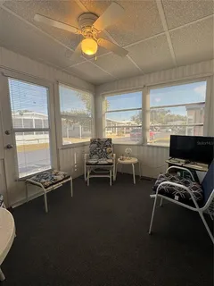 a room with furniture and windows