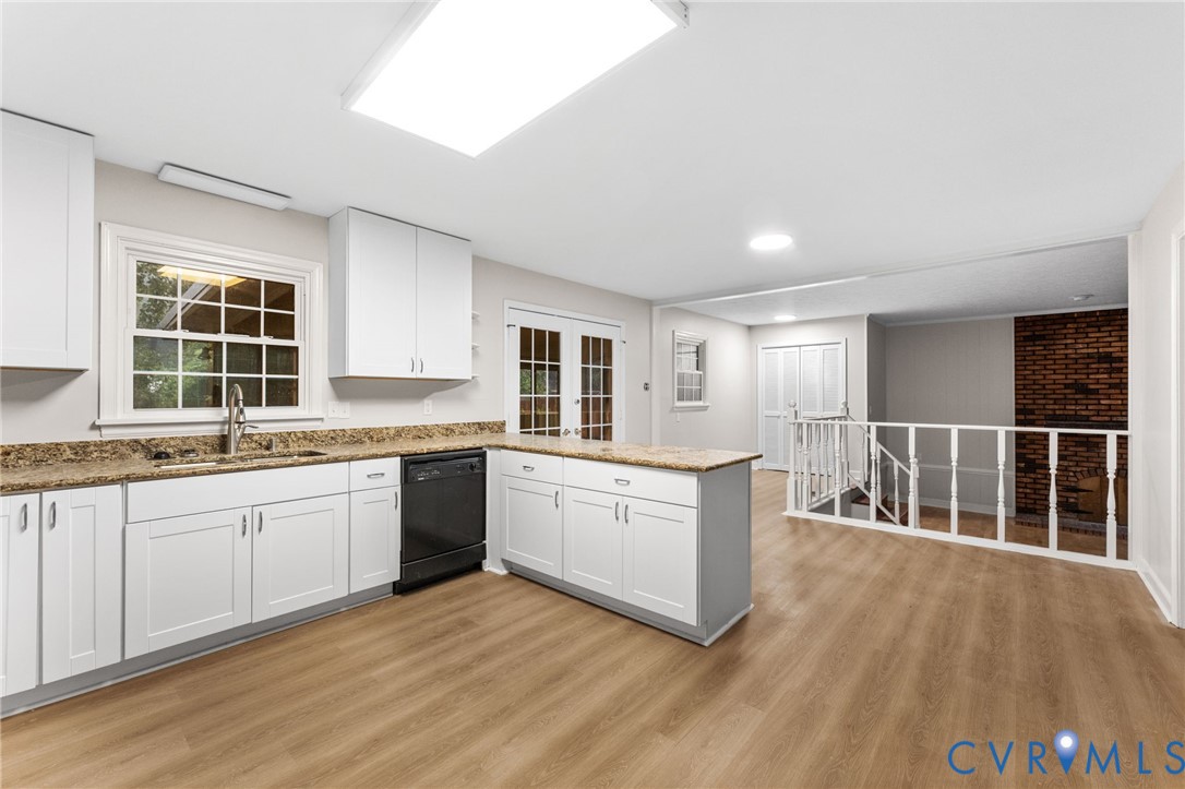3151 Mountclair Road Chester, VA 23831 - Photo 13 of 36 Kitchen featuring white cabinetry, a central islan
