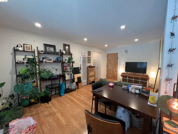 a room with furniture and a flat screen tv