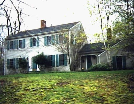 41 Marvin Ridge Place Wilton, CT 06897 - Photo 1 of 1 a front view of a house with garden