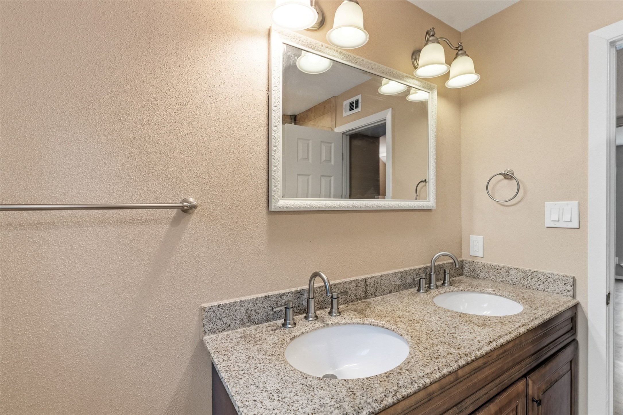 702 Castle Ridge Road, Unit C Austin, TX 78746 - Photo 14 of 36 A full bathroom serves both bedrooms