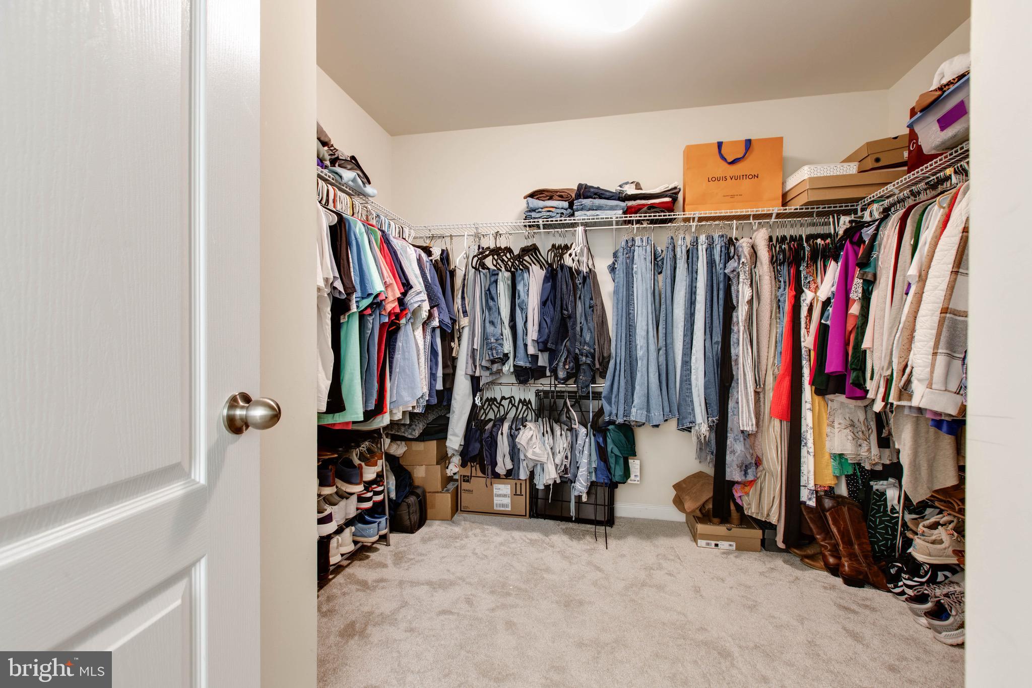 7870 Sunhaven Way Severn, MD 21144 - Photo 35 of 70 a view of walk in closet with clothes