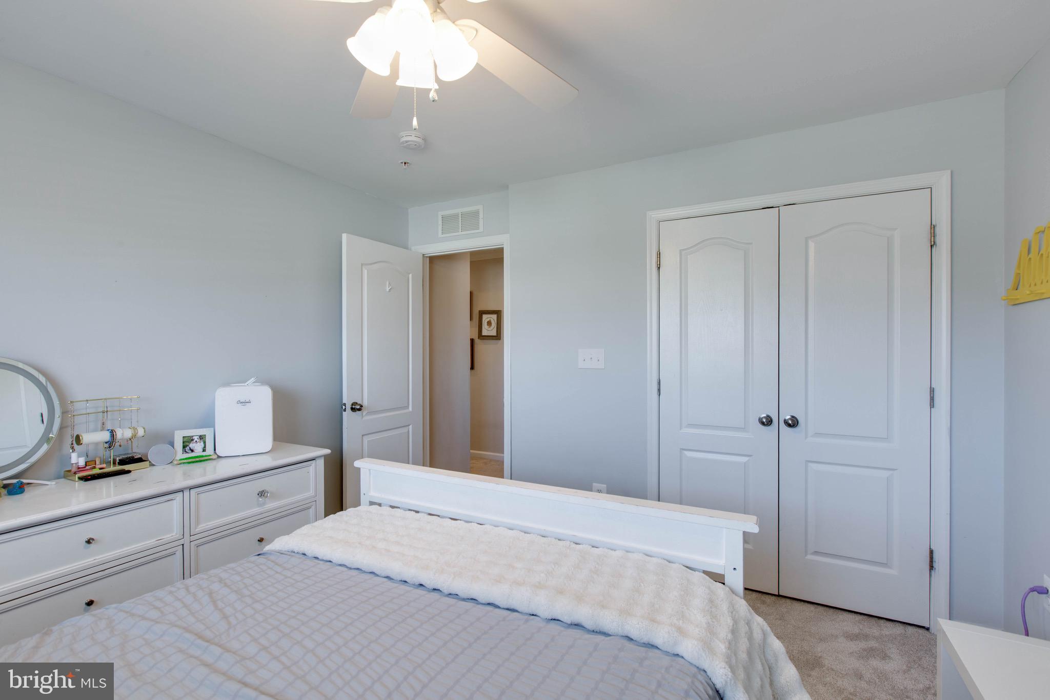 7870 Sunhaven Way Severn, MD 21144 - Photo 38 of 70 a bedroom with a bed and a dresser