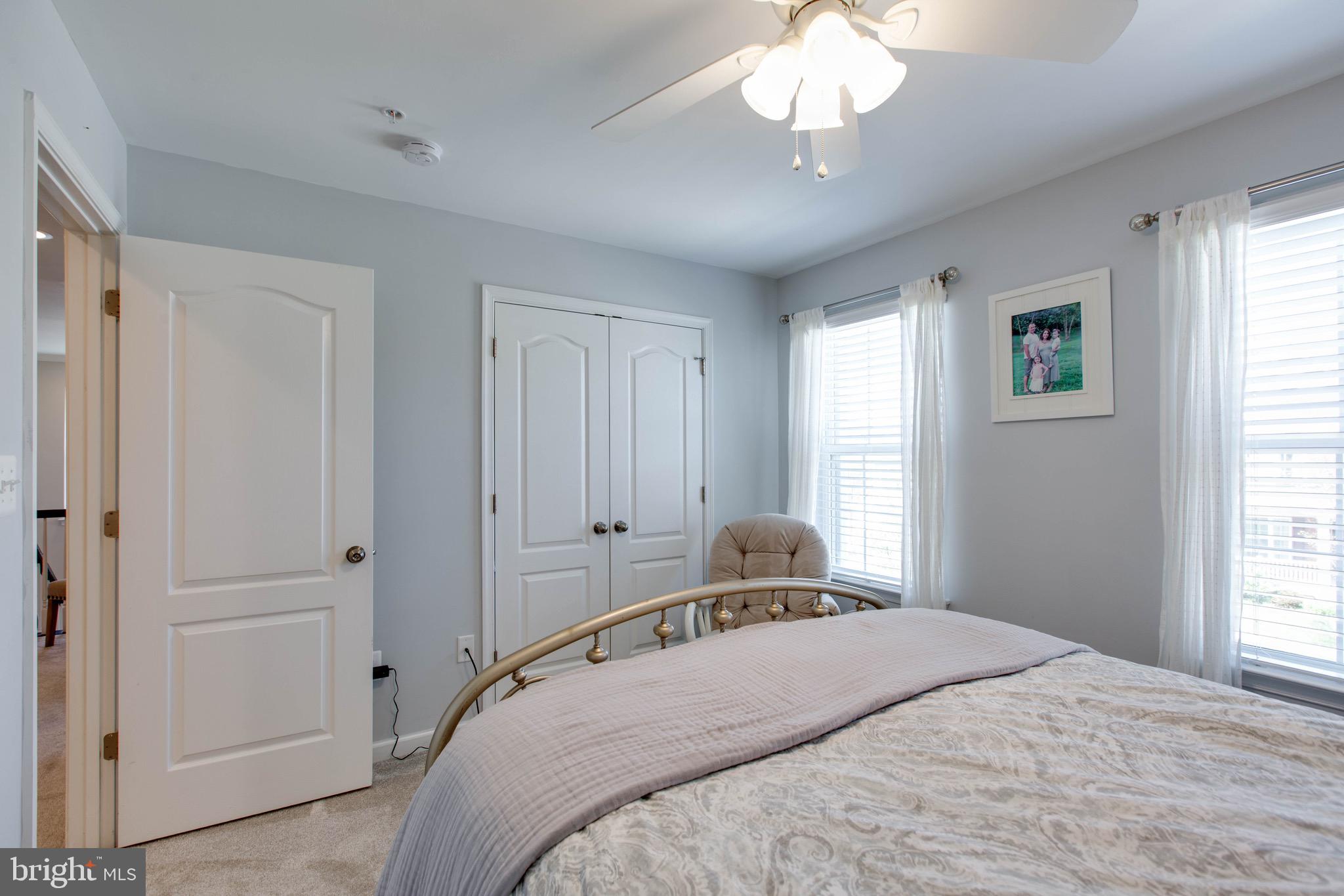 7870 Sunhaven Way Severn, MD 21144 - Photo 41 of 70 a bedroom with a large bed and a window