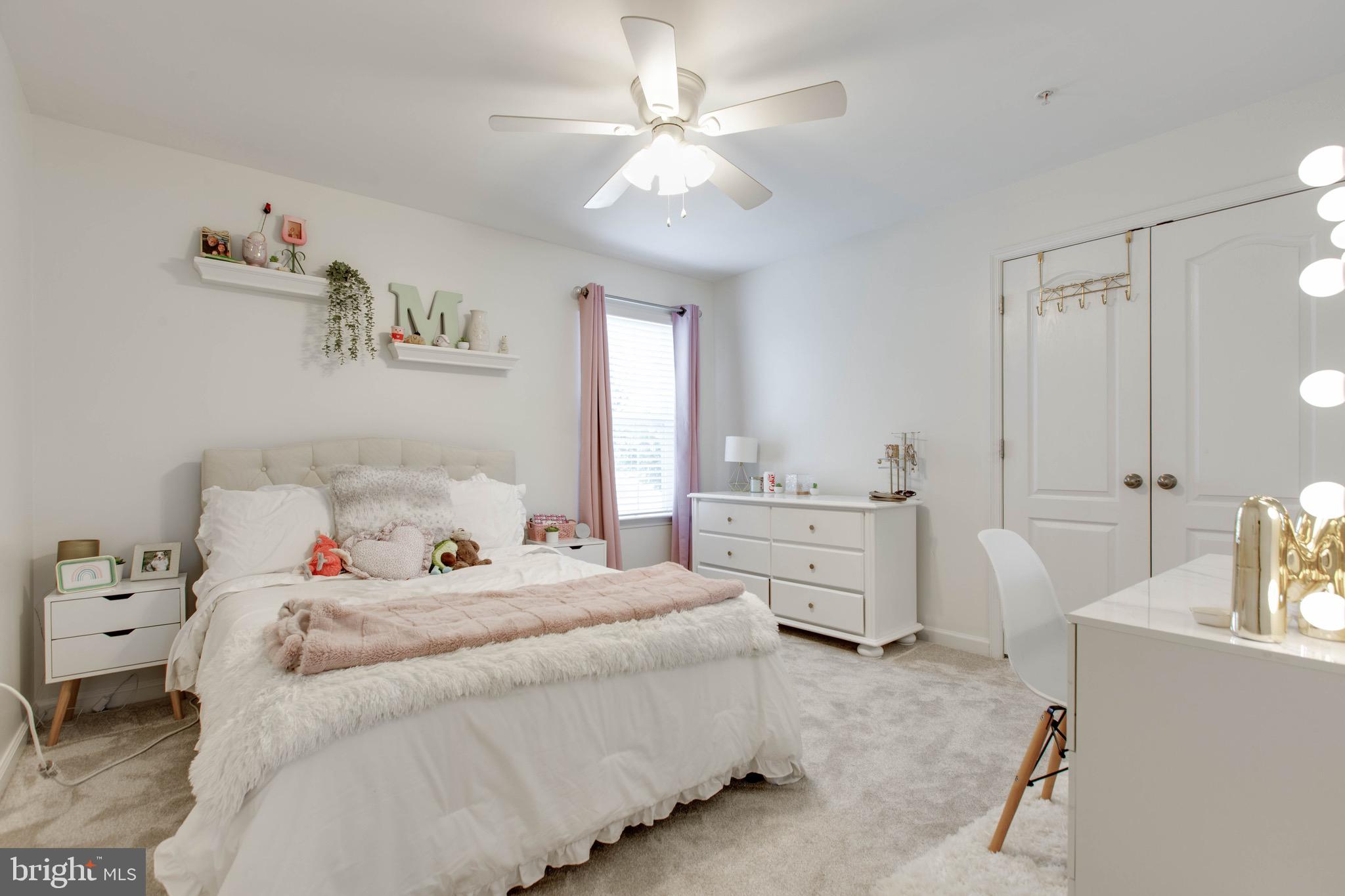7870 Sunhaven Way Severn, MD 21144 - Photo 44 of 70 a bedroom with a bed and ceiling fan