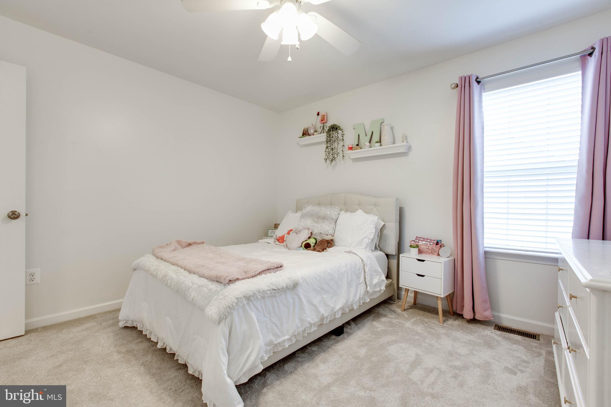7870 Sunhaven Way Severn, MD 21144 - Photo 46 of 70 a bedroom with a bed and a window