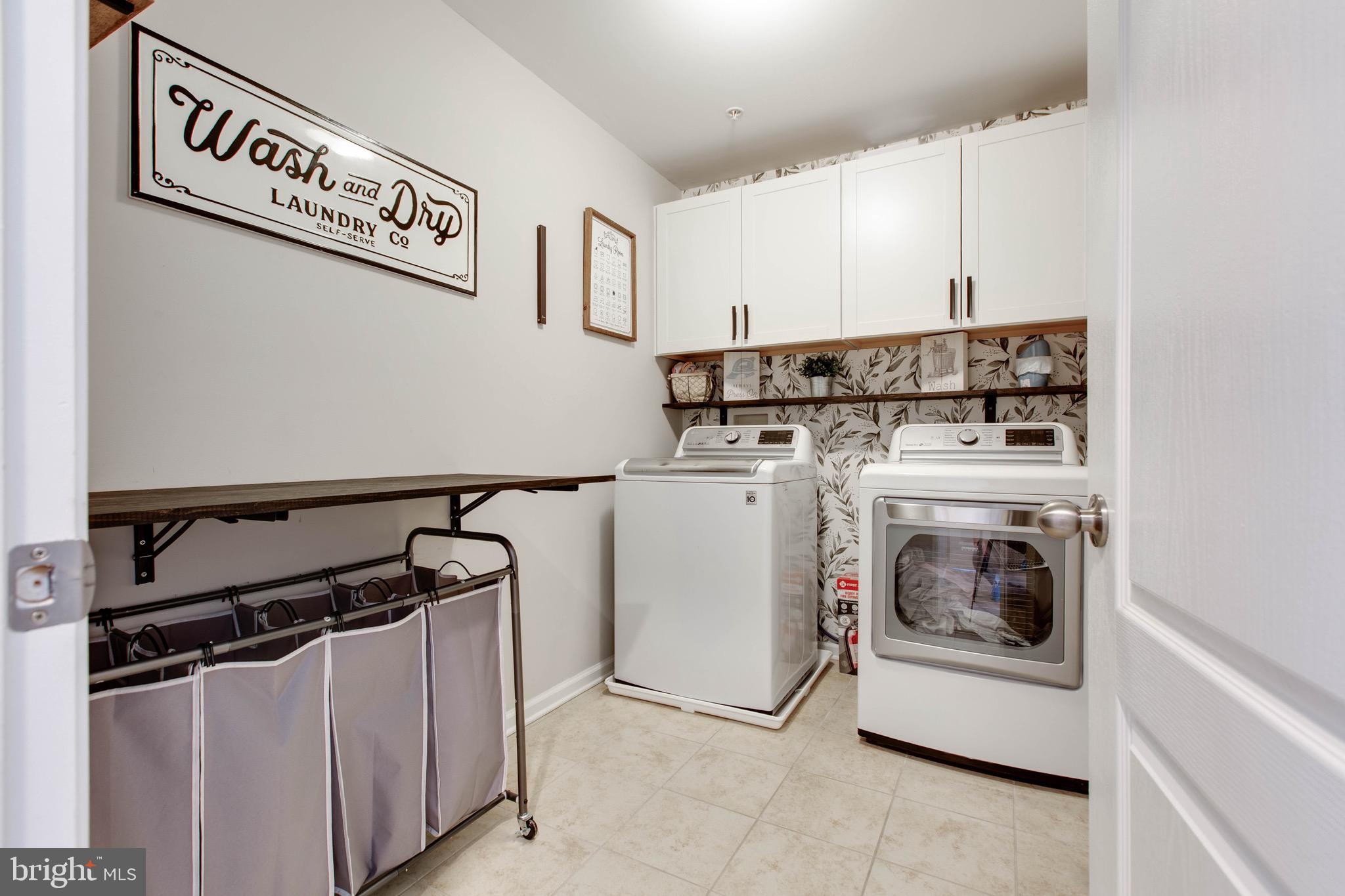 7870 Sunhaven Way Severn, MD 21144 - Photo 48 of 70 a utility room with dryer and washer
