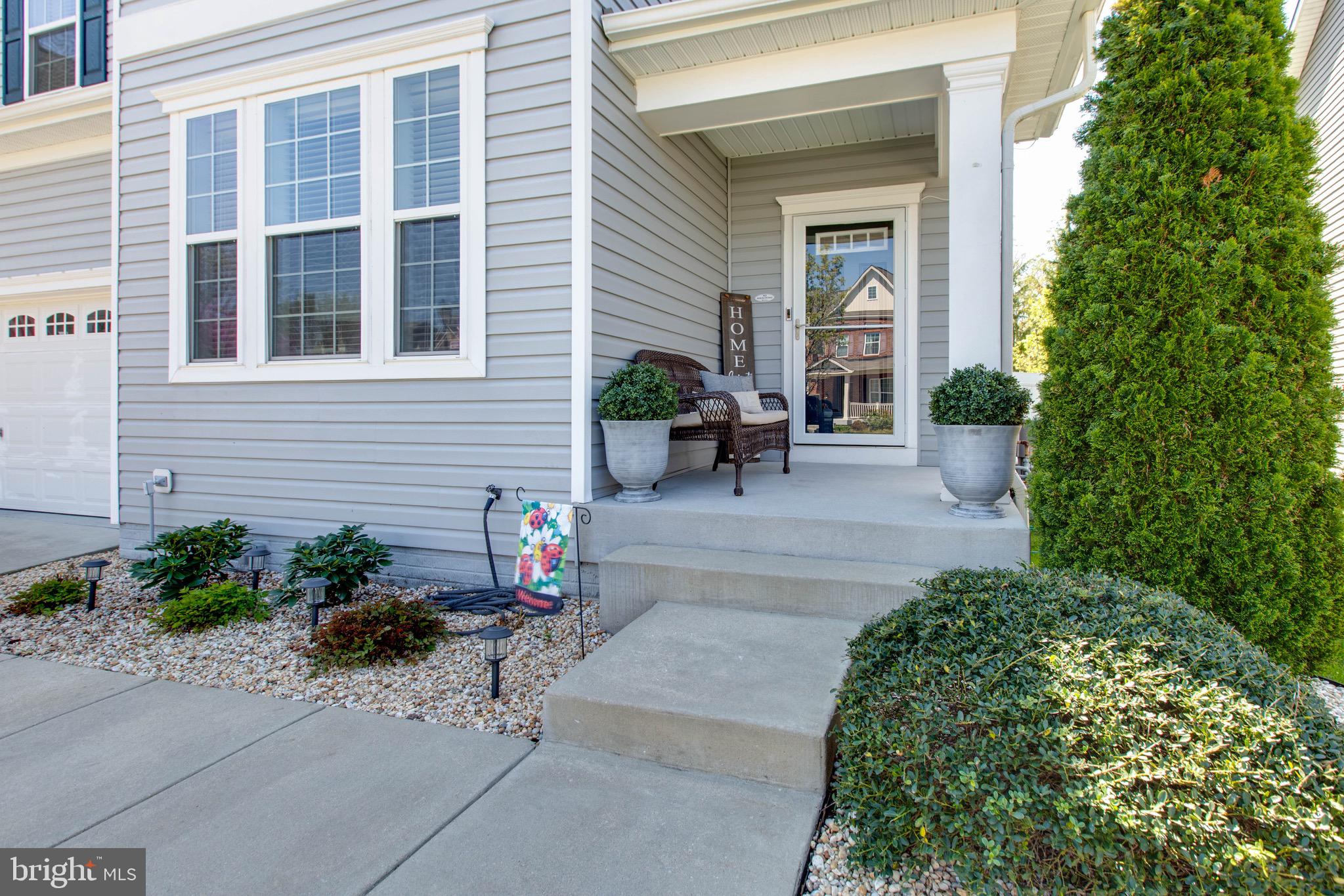 7870 Sunhaven Way Severn, MD 21144 - Photo 5 of 70 a view of a house with sitting area and garden