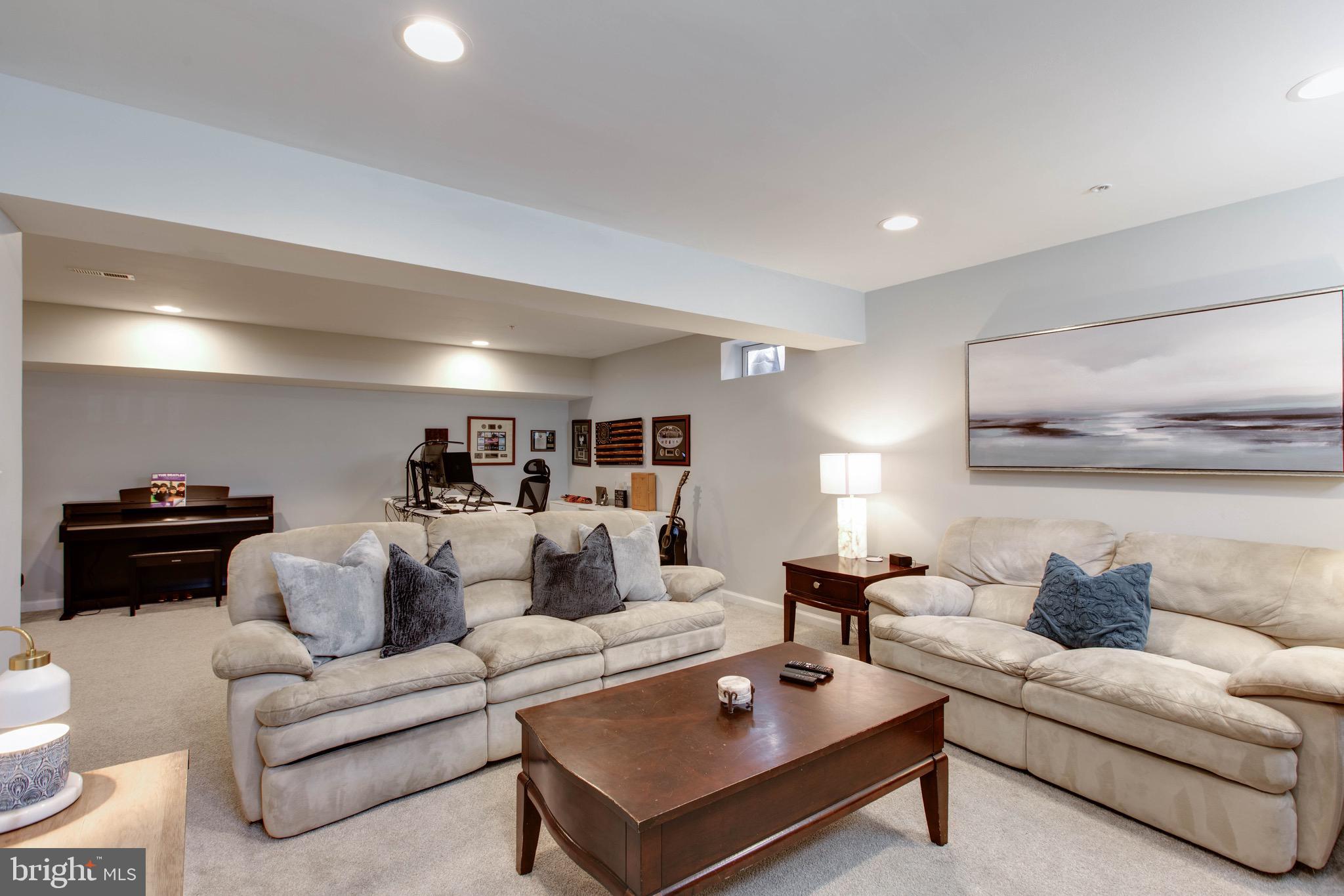 7870 Sunhaven Way Severn, MD 21144 - Photo 57 of 70 a living room with furniture and a couch