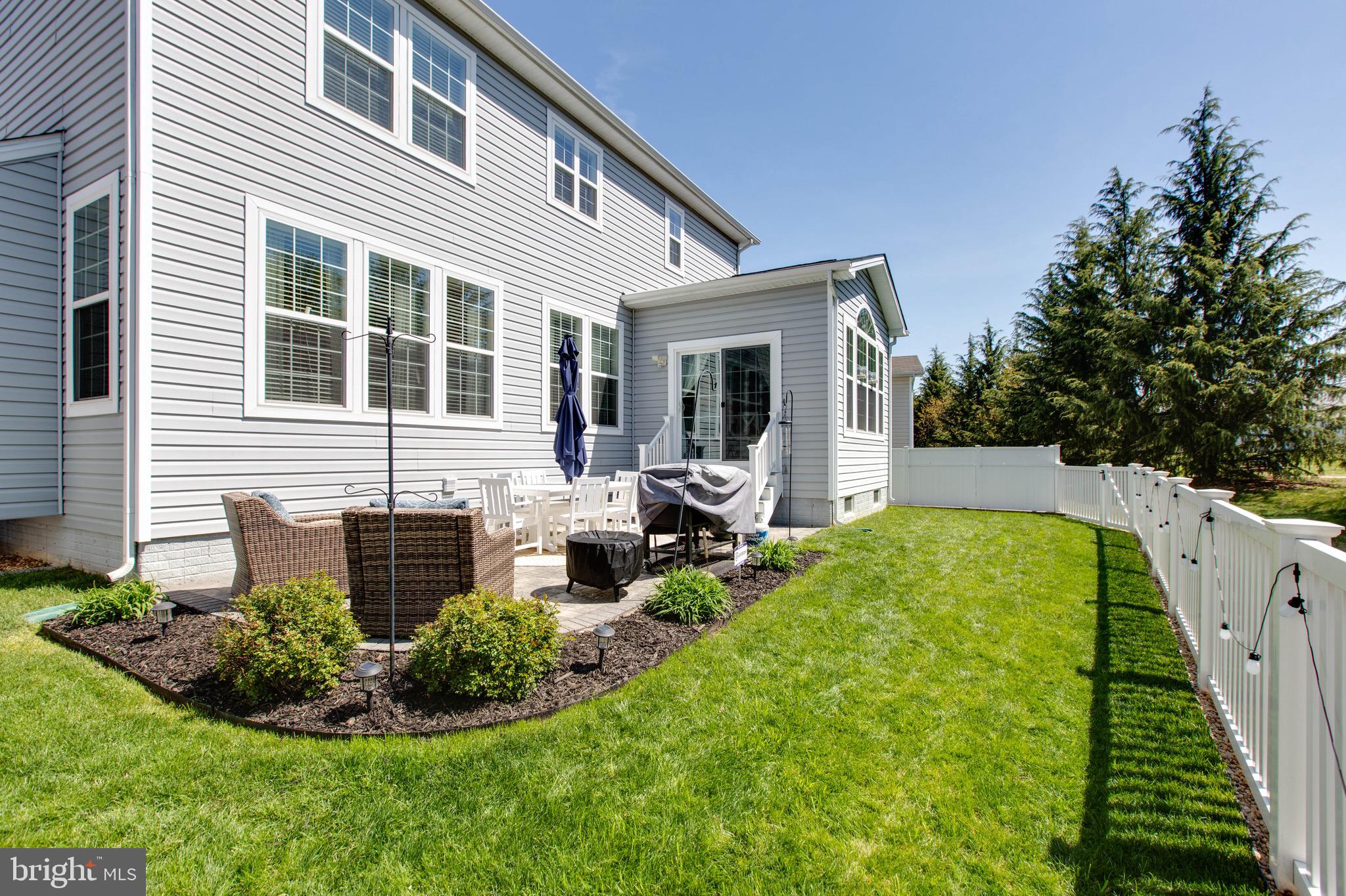 7870 Sunhaven Way Severn, MD 21144 - Photo 59 of 70 a view of a house with backyard and sitting area