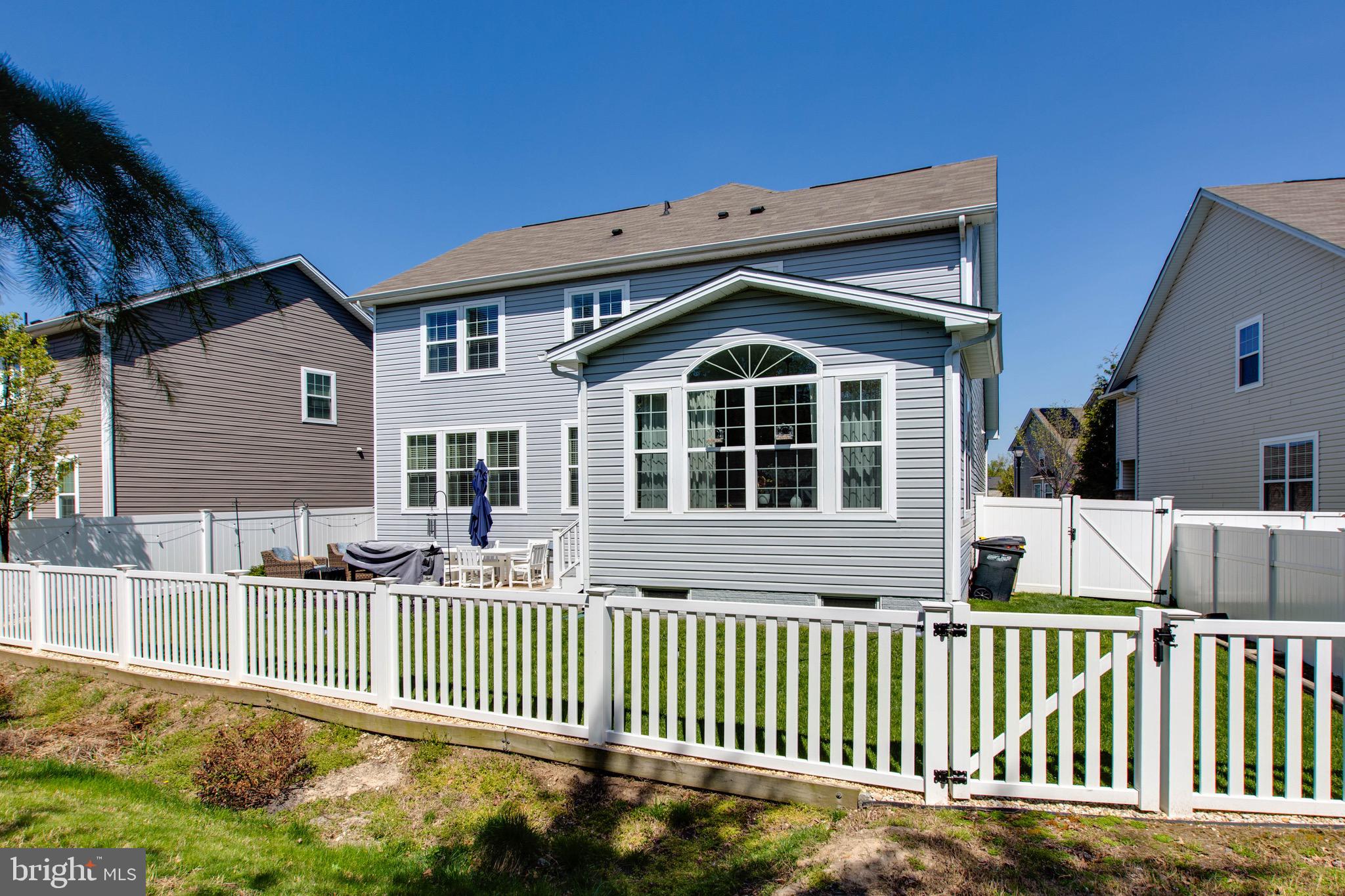 7870 Sunhaven Way Severn, MD 21144 - Photo 63 of 70 a front view of a house with a garden