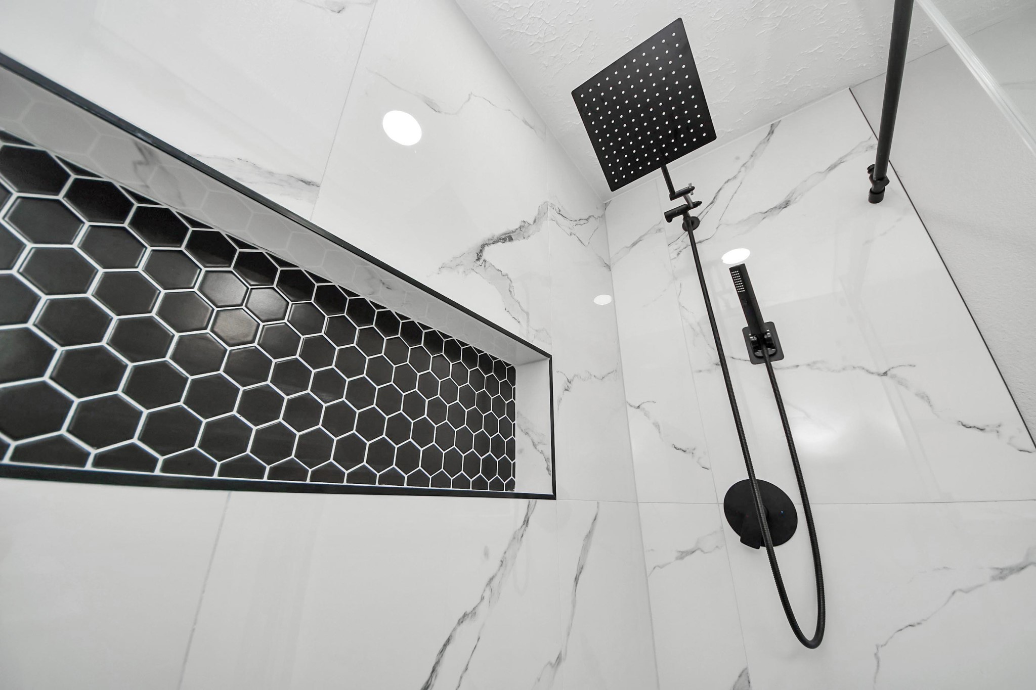 20010 Cottonglade Lane Humble, TX 77338 - Photo 15 of 27 a bathroom with a shower