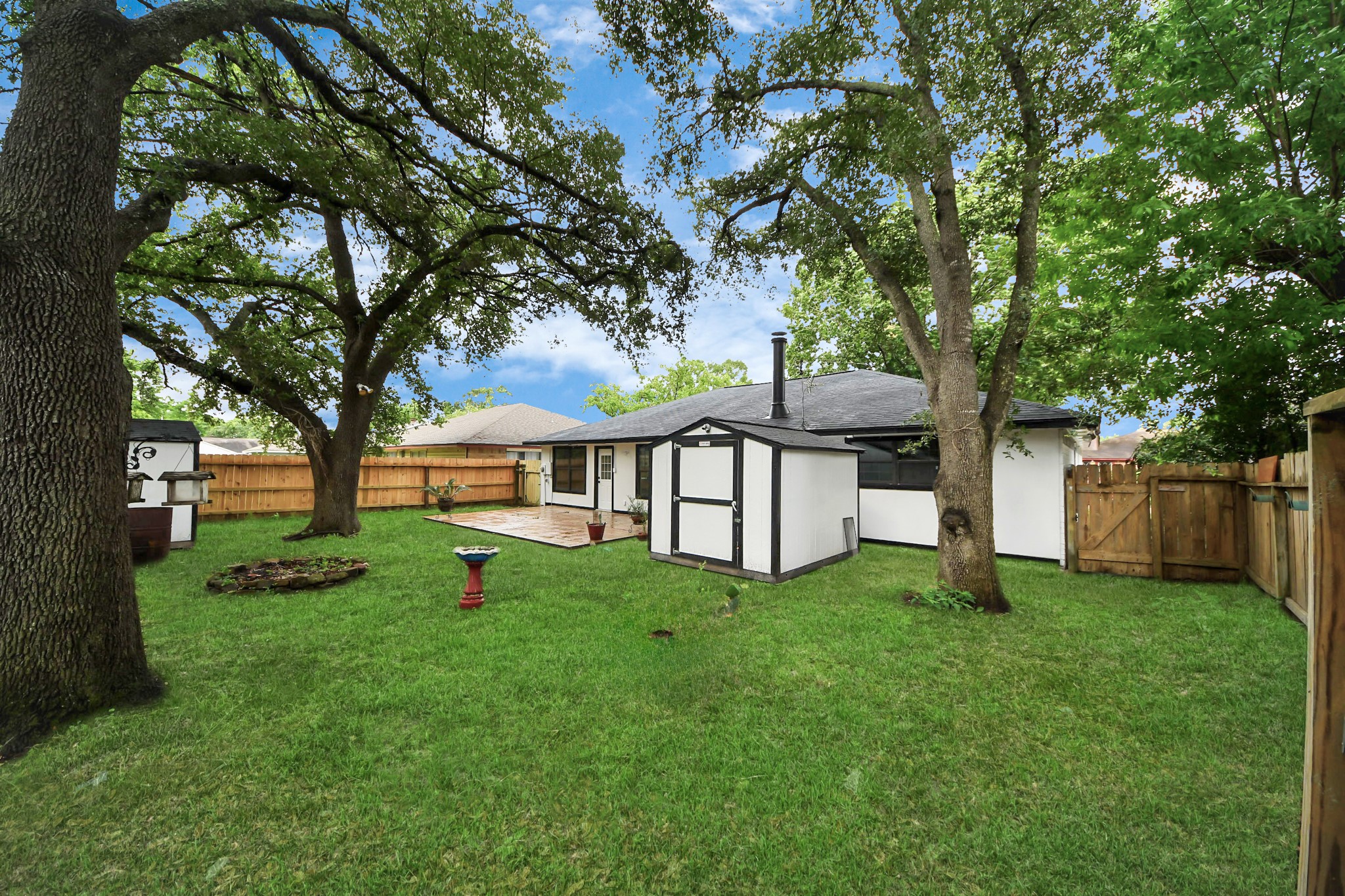 20010 Cottonglade Lane Humble, TX 77338 - Photo 25 of 27 a view of a house with backyard