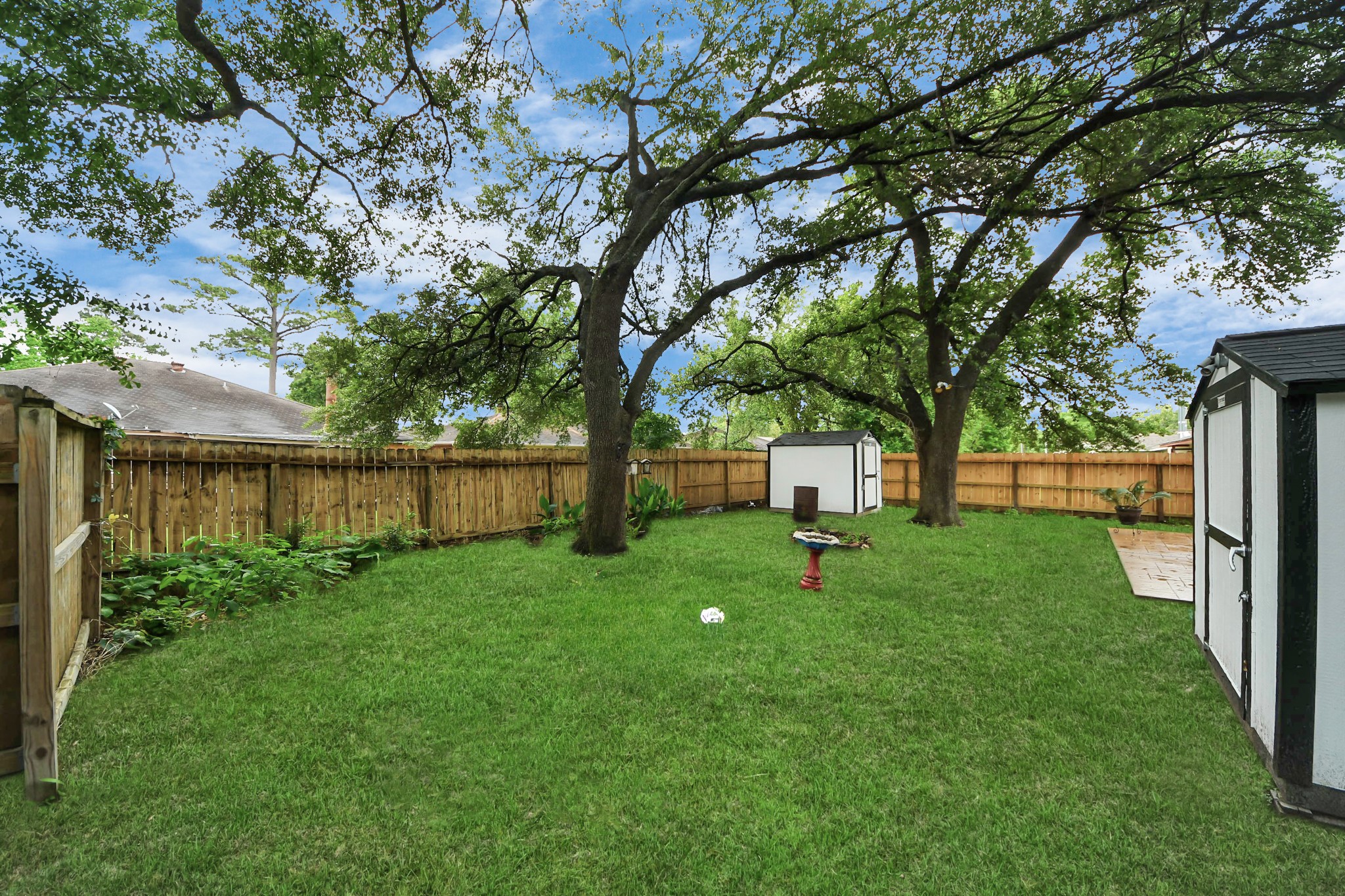 20010 Cottonglade Lane Humble, TX 77338 - Photo 26 of 27 a view of backyard with deck and green space