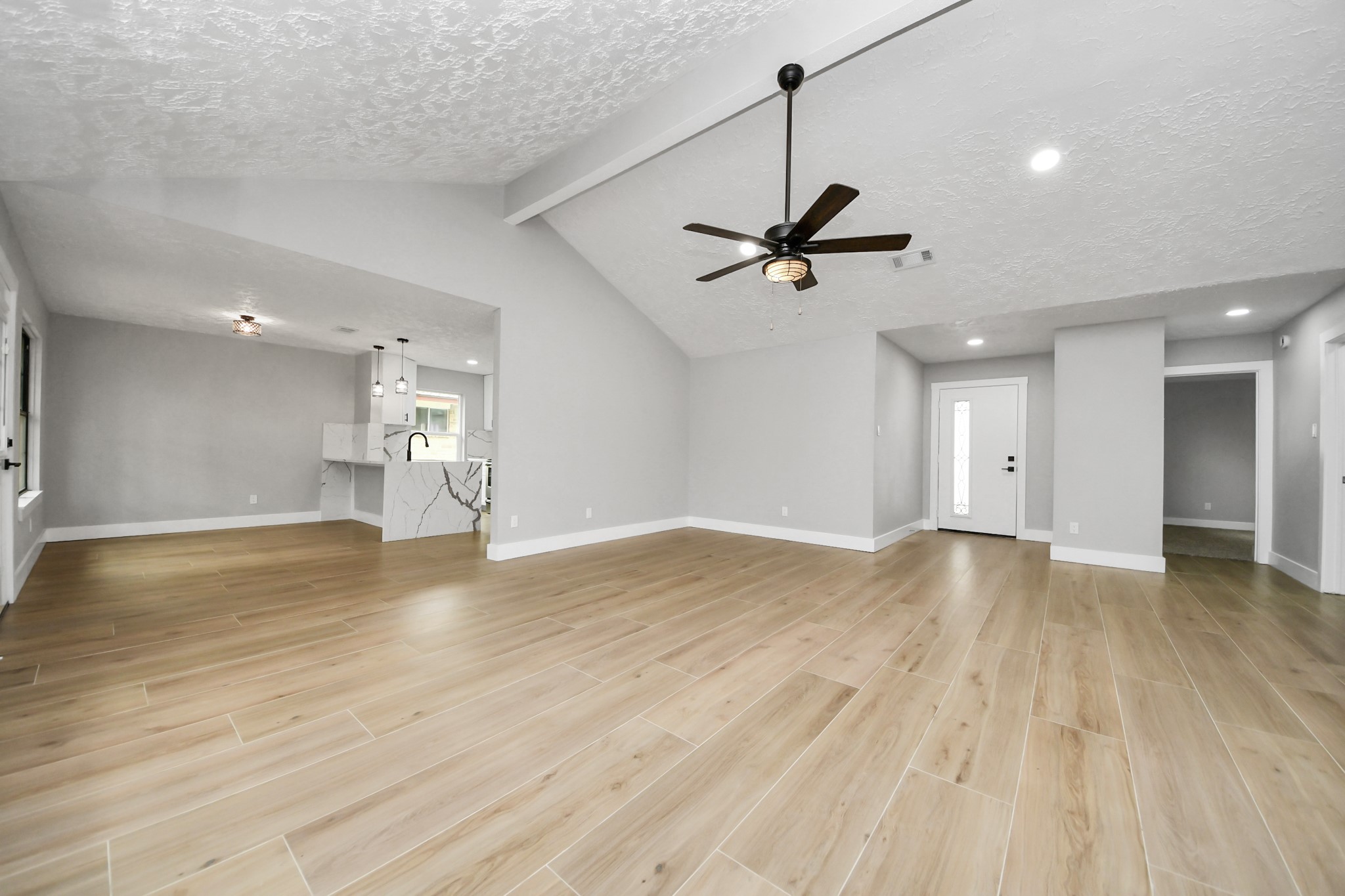 20010 Cottonglade Lane Humble, TX 77338 - Photo 27 of 27 a view of an empty room and wooden floor