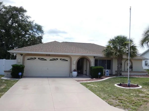 $358,000 | 8158 Winding Oak Lane, Spring Hill, FL 34606