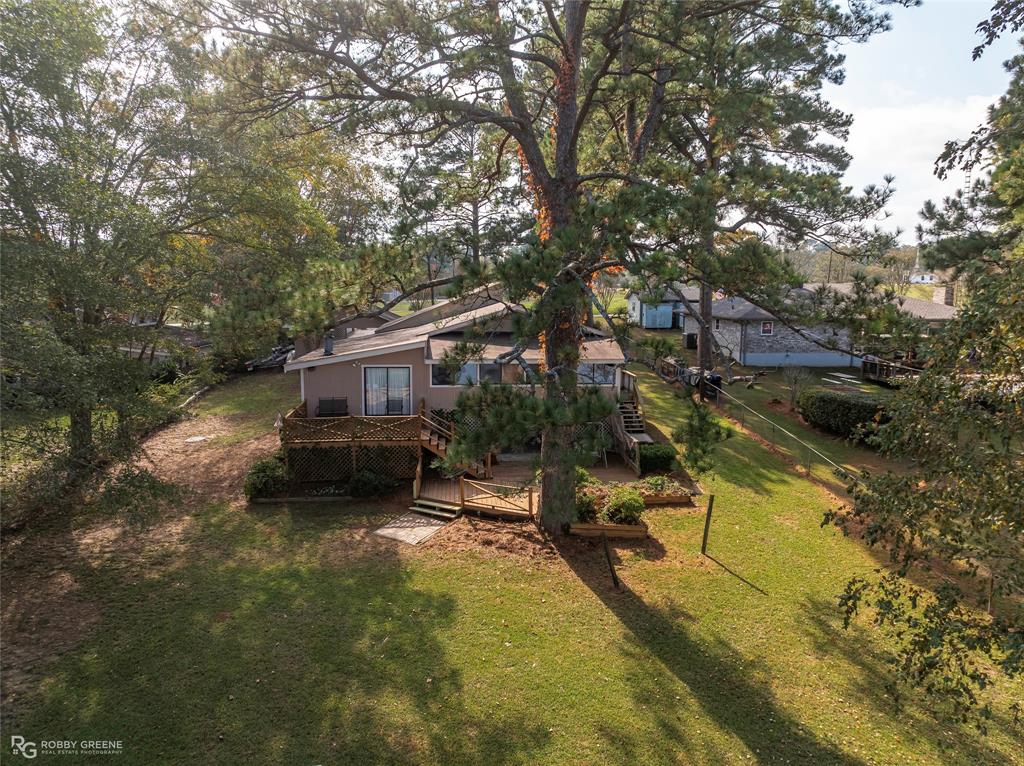 114 Quail Trail Homer, LA 71040 - Photo 34 of 40 a view of a house with a yard