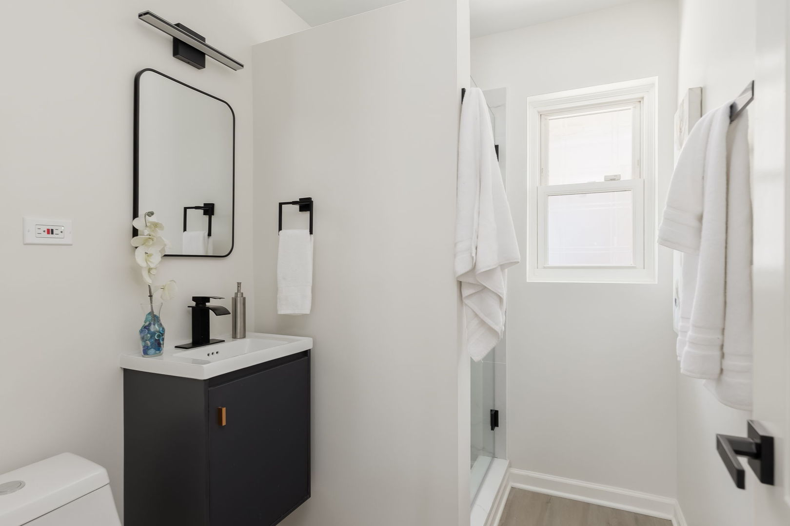 501 Byrd Road Riverside, IL 60546 - Photo 28 of 29 a bathroom with a sink vanity and a mirror
