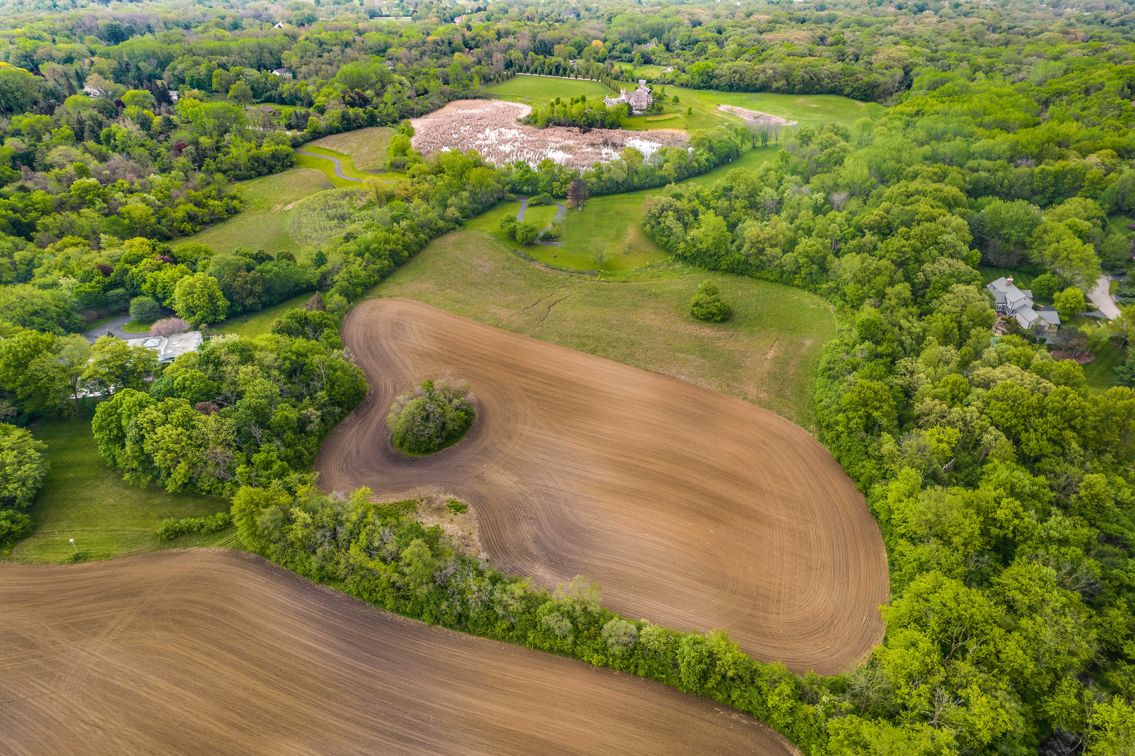 3159 Cuba Road Long Grove, IL 60047 - Photo 2 of 6 a view of a lake with a park