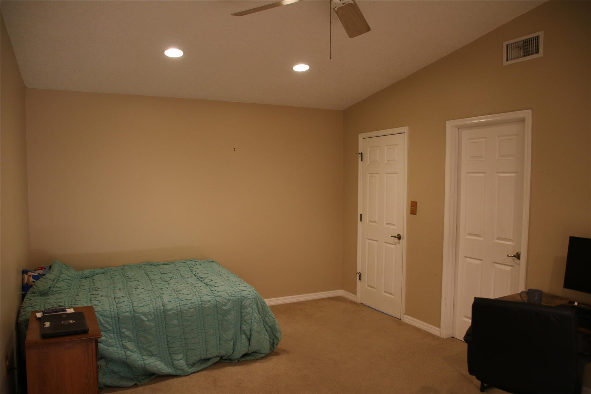 1433 Captains Walk, Unit C Fort Pierce, FL 34950 - Photo 6 of 11 a view of a livingroom with furniture and a ceiling fan