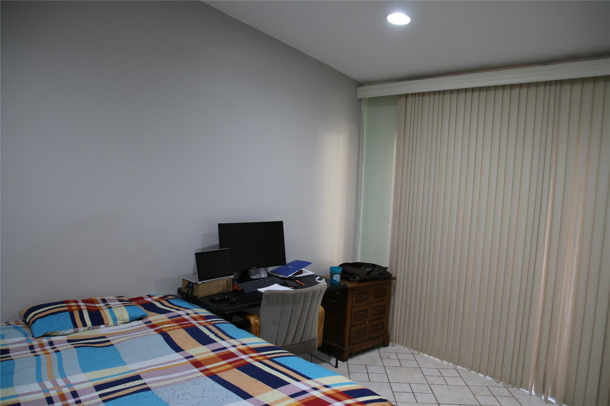 1433 Captains Walk, Unit C Fort Pierce, FL 34950 - Photo 9 of 11 a view of a workspace with furniture and a window