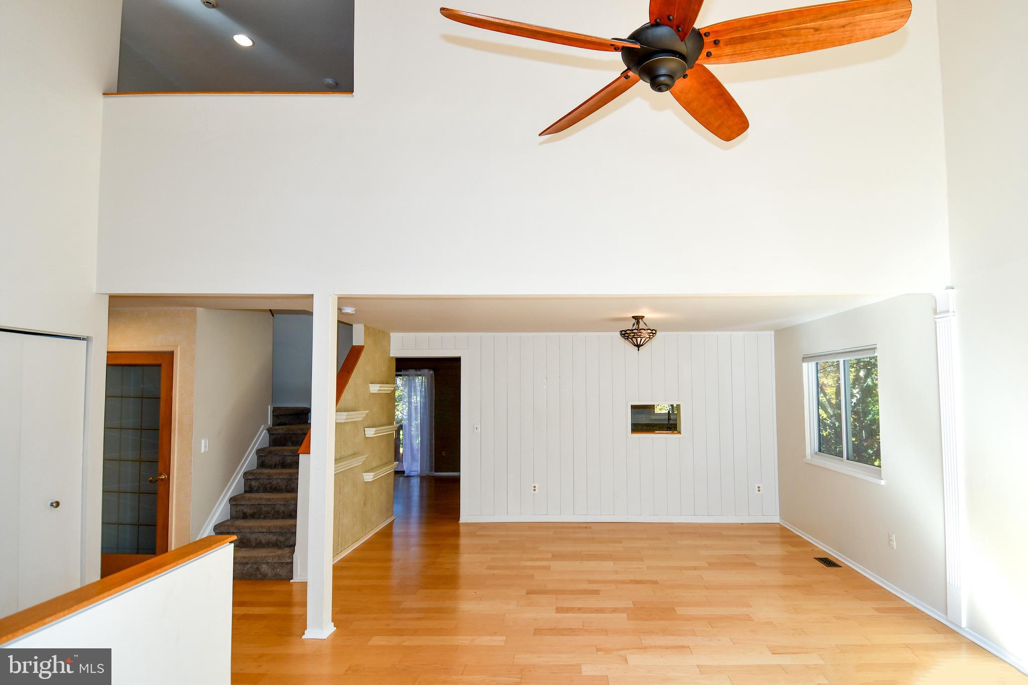 39 Windwhisper Lane Annapolis, MD 21403 - Photo 15 of 64 wooden floor in an empty room with a window