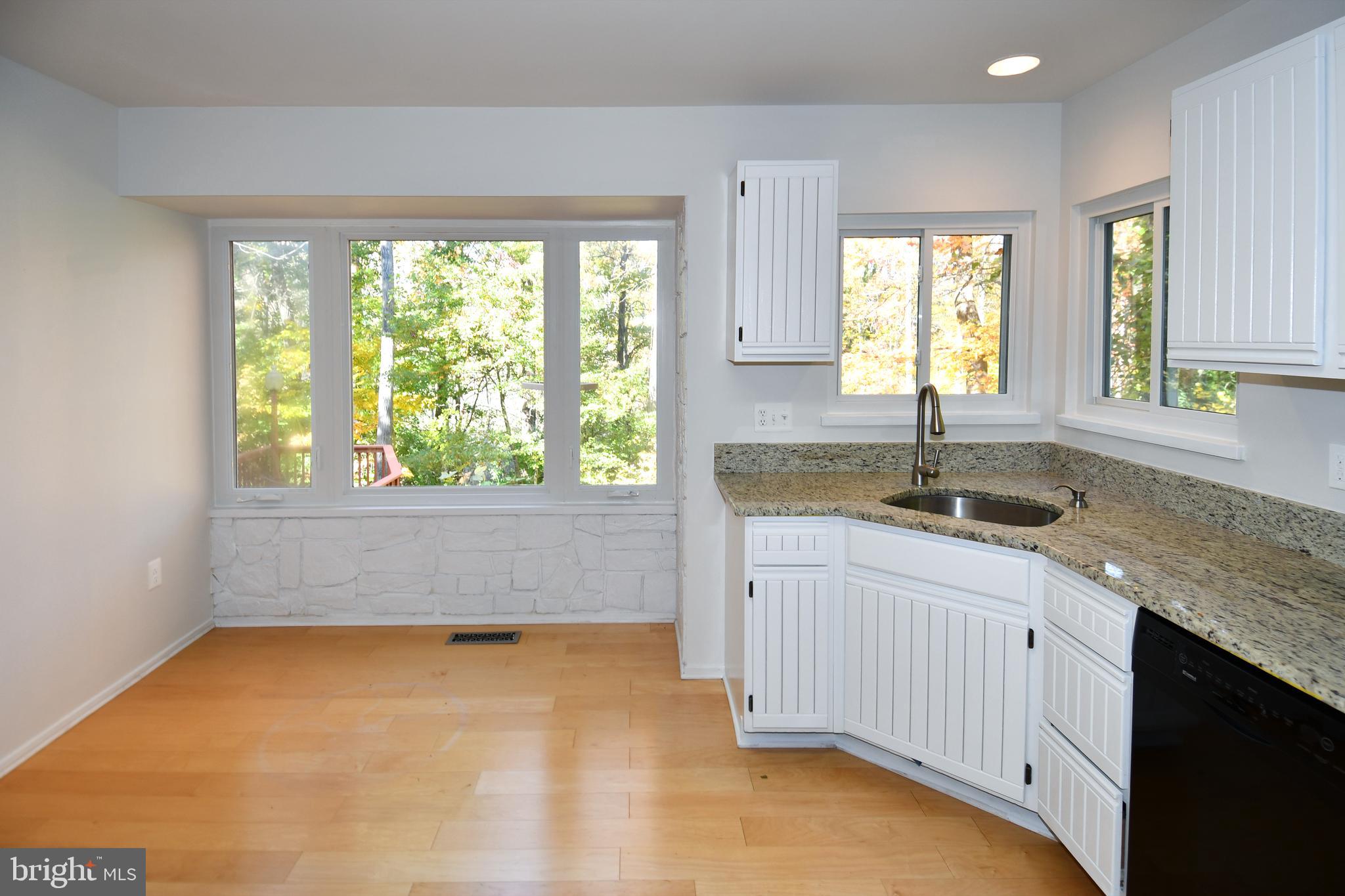 39 Windwhisper Lane Annapolis, MD 21403 - Photo 16 of 64 a kitchen with sink and window