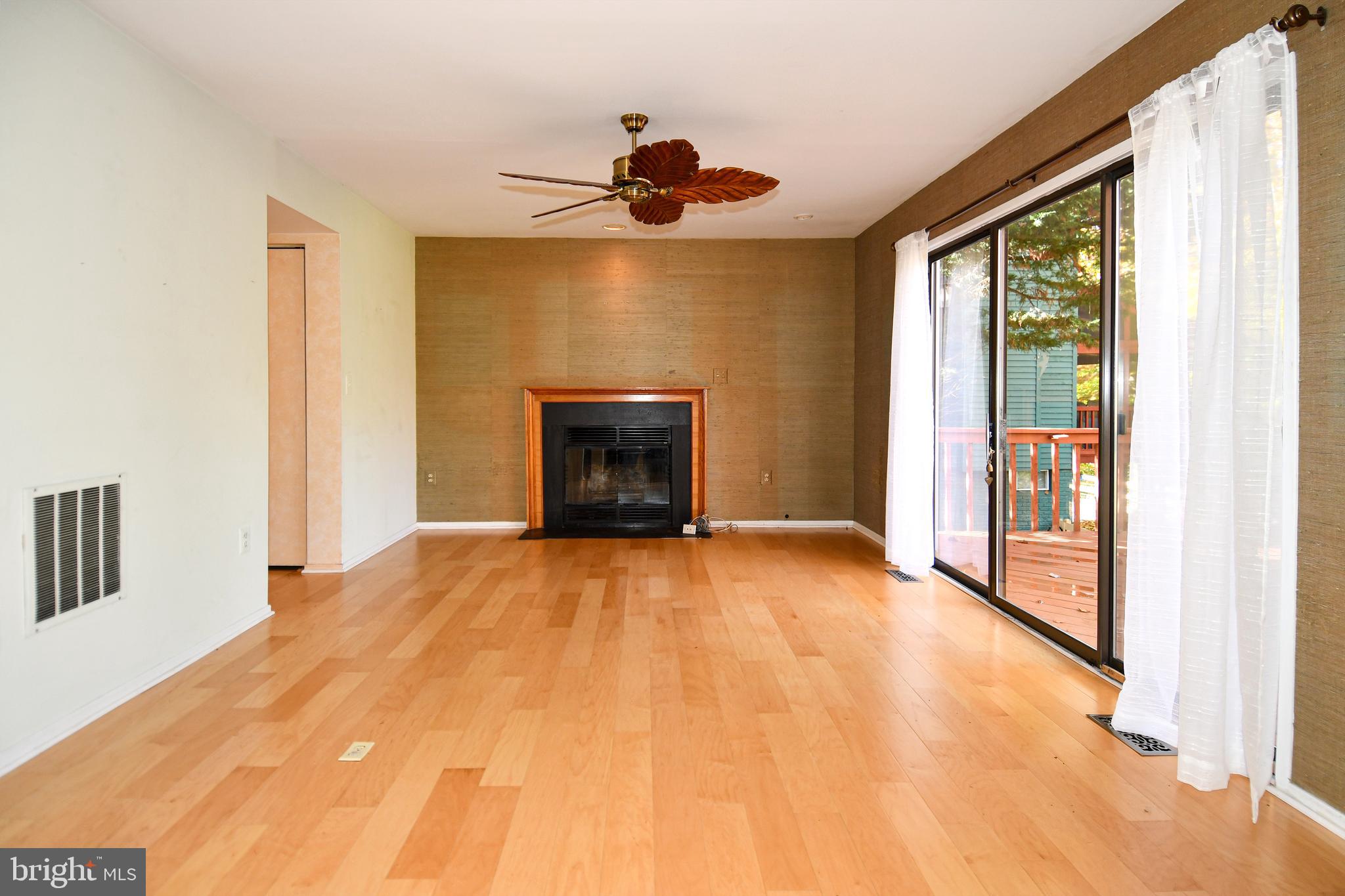 39 Windwhisper Lane Annapolis, MD 21403 - Photo 20 of 64 a view of empty room with a fireplace