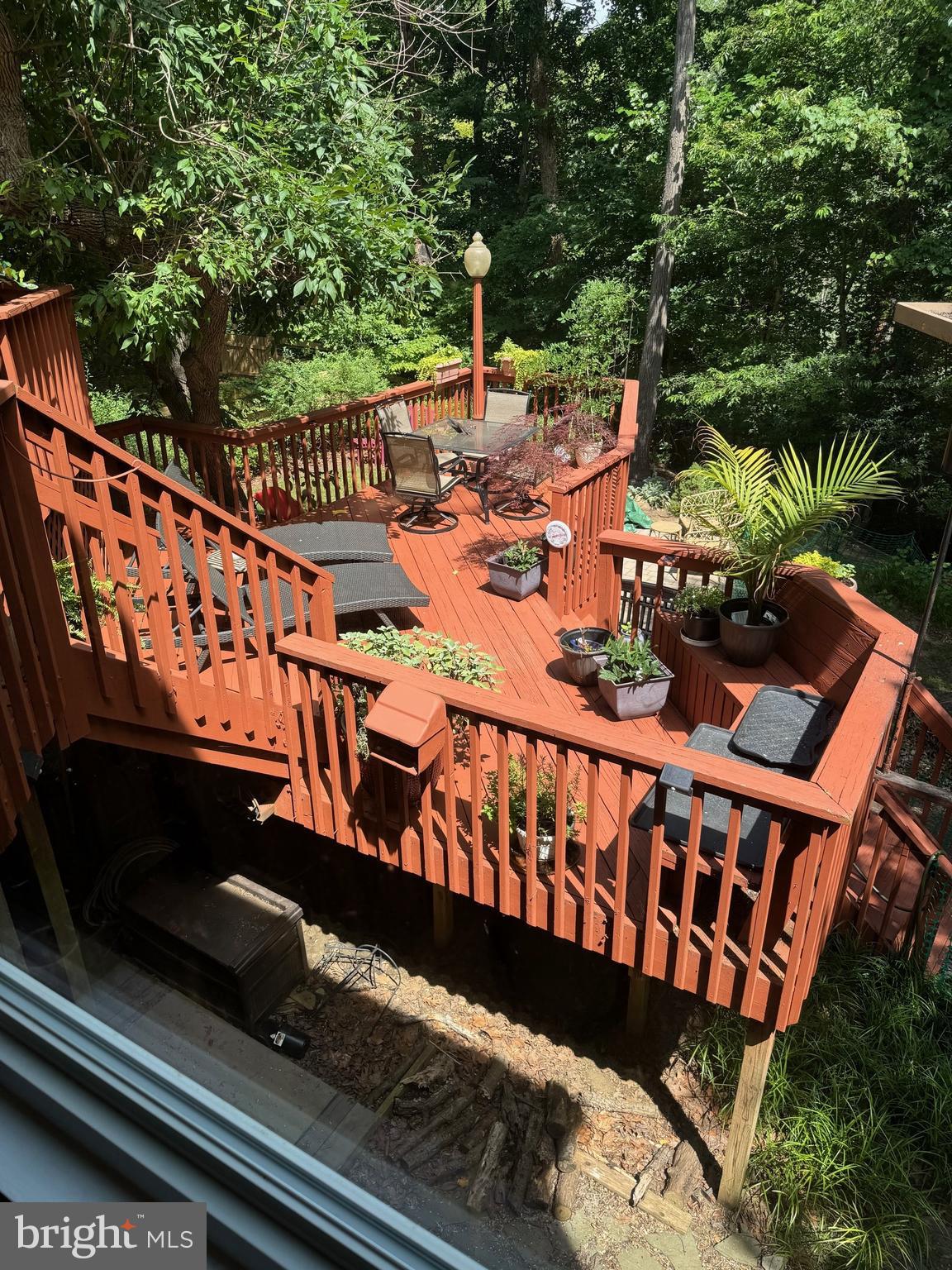 39 Windwhisper Lane Annapolis, MD 21403 - Photo 3 of 64 a view of balcony with wooden floor and outdoor seating