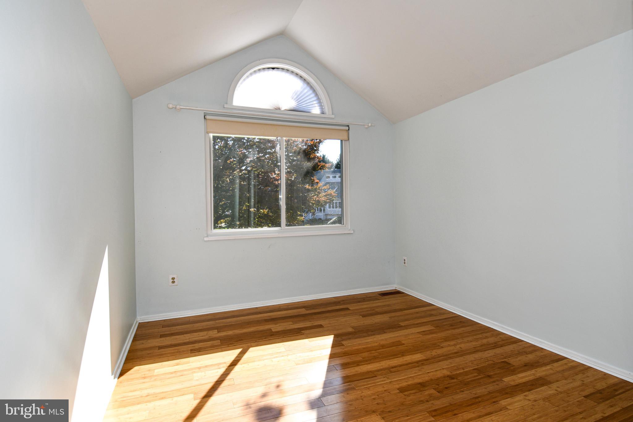39 Windwhisper Lane Annapolis, MD 21403 - Photo 32 of 64 a view of empty room with wooden floor and fan