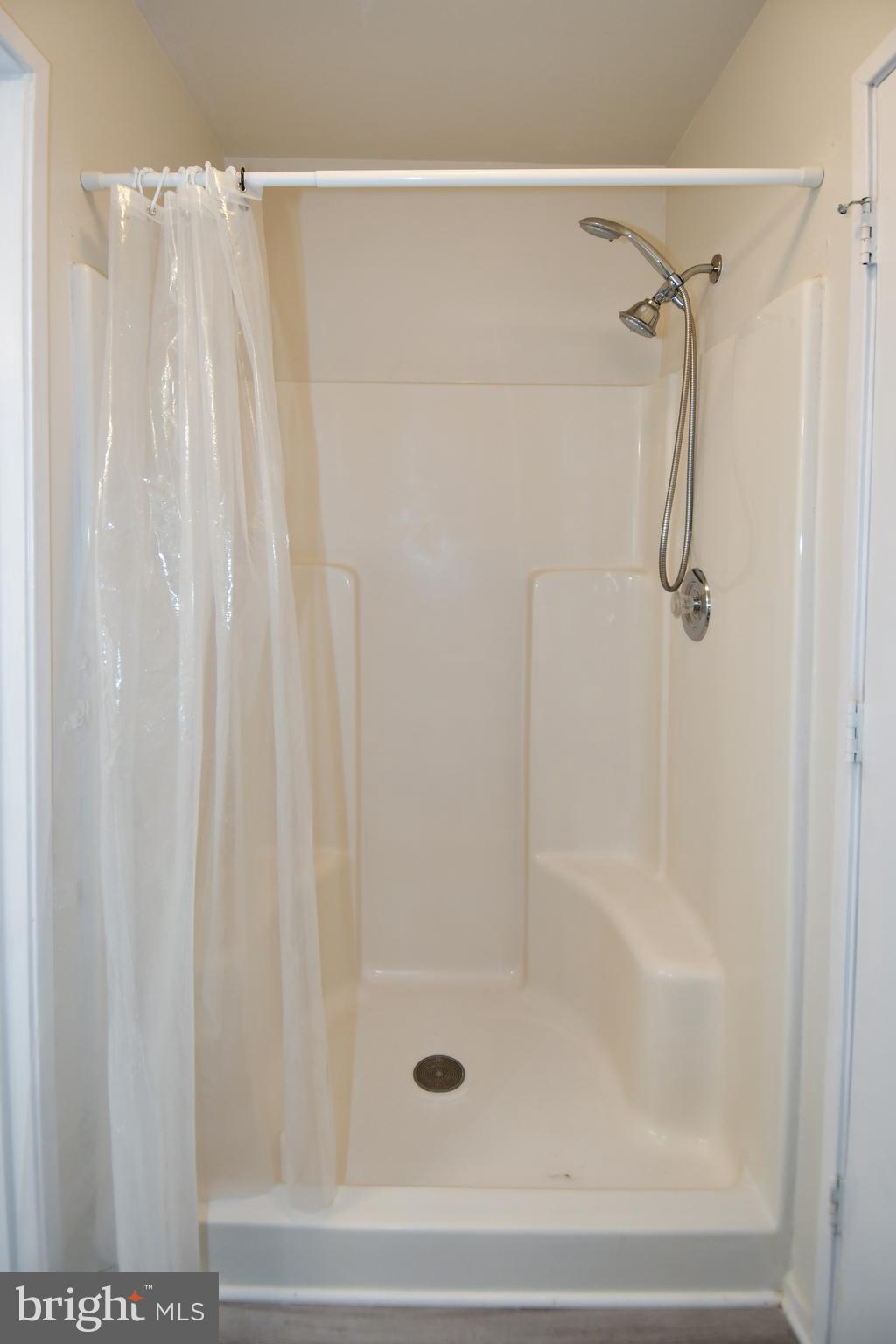 39 Windwhisper Lane Annapolis, MD 21403 - Photo 47 of 64 a bathroom with a shower